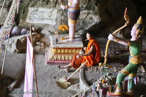 MonkCaveLaosLoop Monk Smoking in Laos Cave
