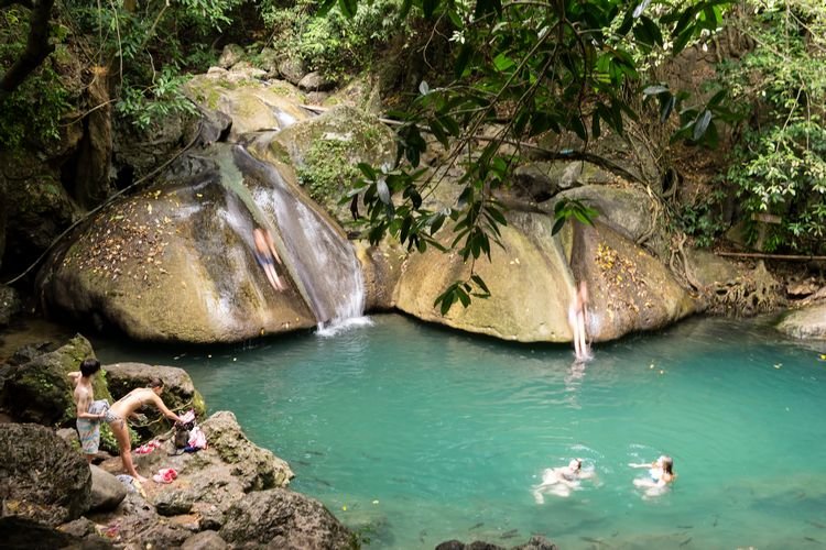natural rock slides at Erawan Falls in Kanchanaburi Thailand