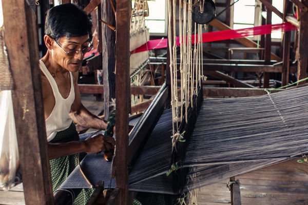 local weaving silk on Inle Lake in Myanmar